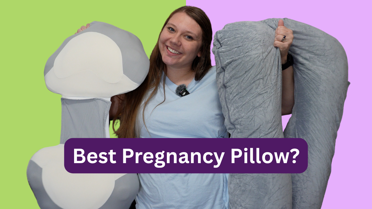 a picture of a woman with long brown hair holding a cat paw pregnancy pillow and a u shaped pregnancy pillow